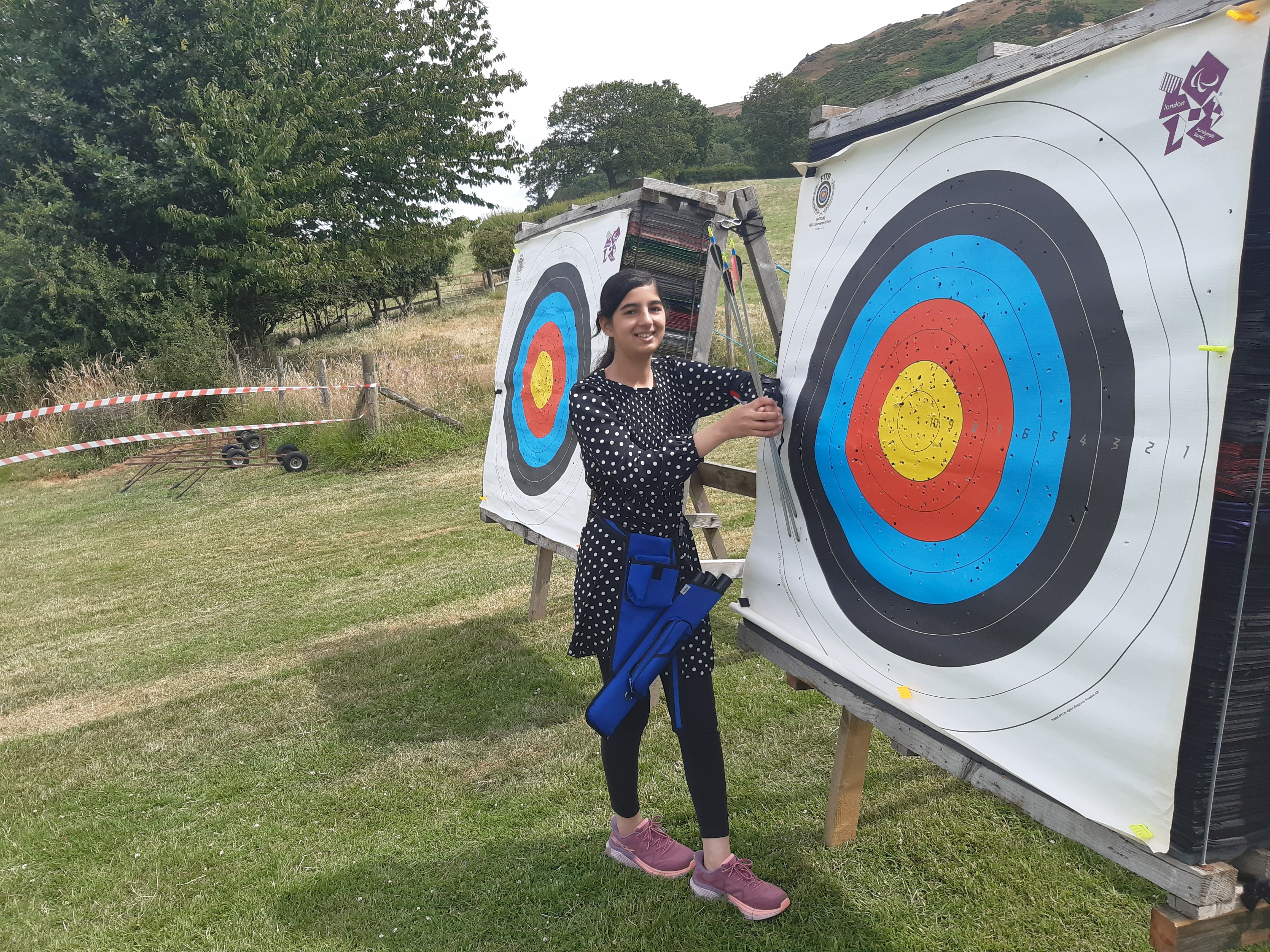 Girl collecting arrows