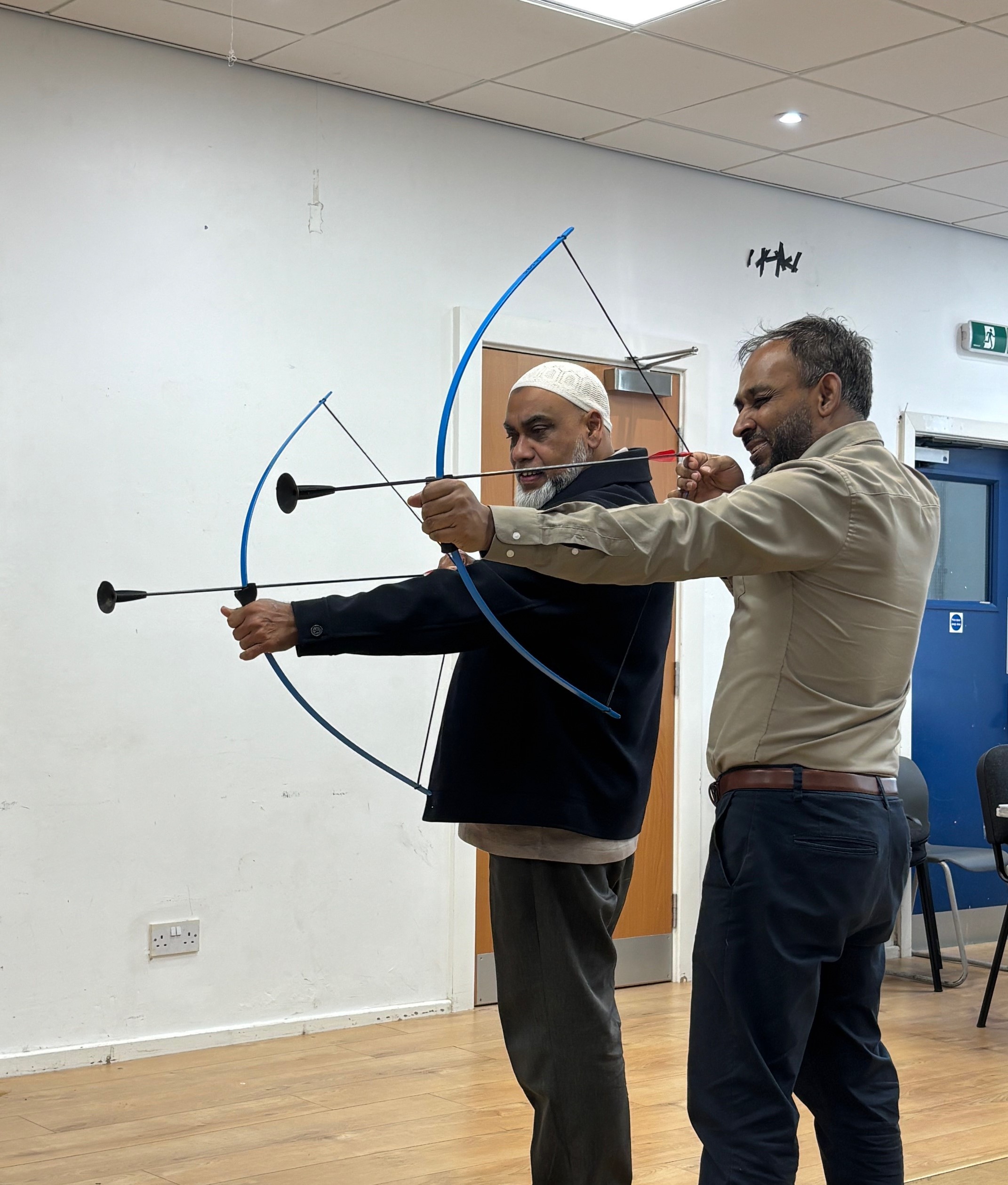 Men doing soft archery